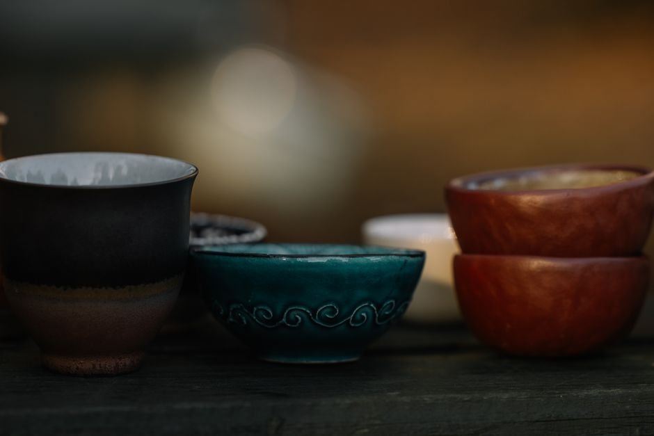 Handcrafted ceramic bowls showing various white glaze textures and finishes