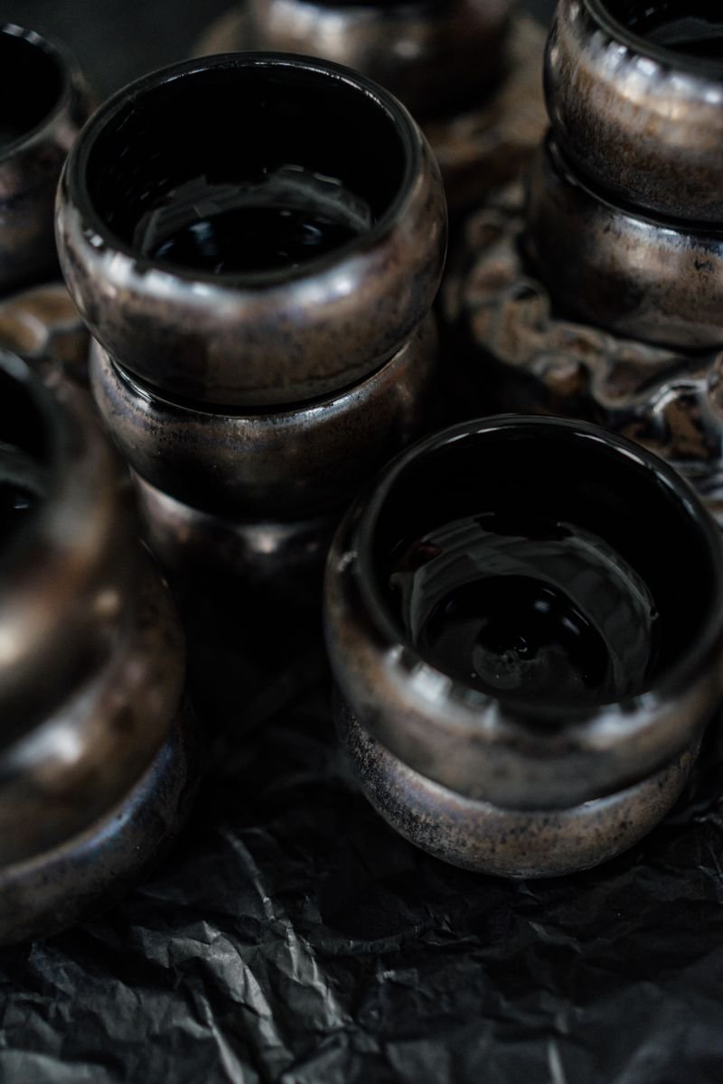 Glossy glazed ceramic pottery close up showing the fired glass surface