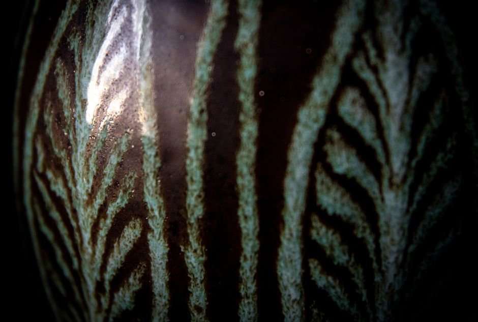 Close up of crystalline glaze formations on fired pottery
