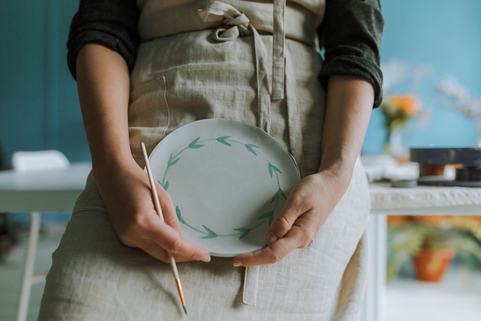 Painting underglaze onto a bisque pottery piece