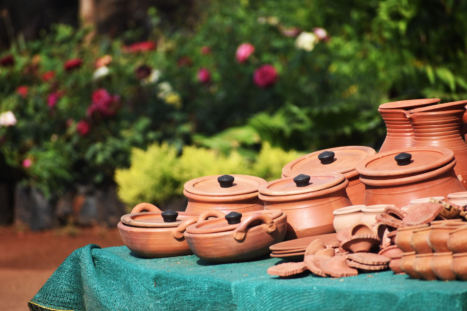 Collection of handmade pottery pieces showing a consistent personal style