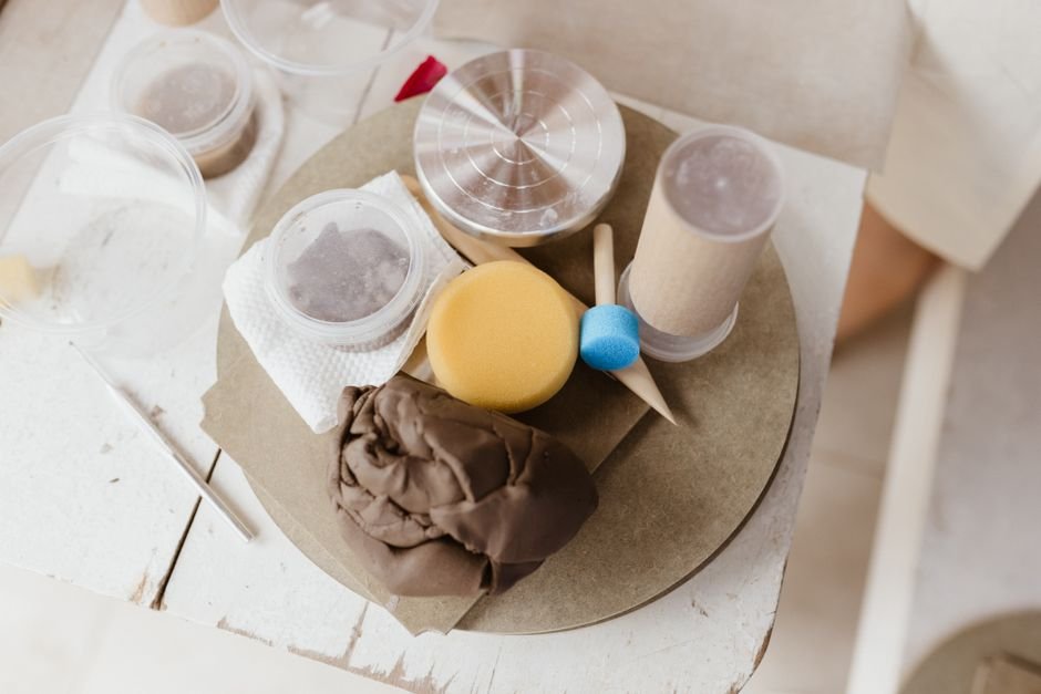Different clay body samples for pottery on a studio table