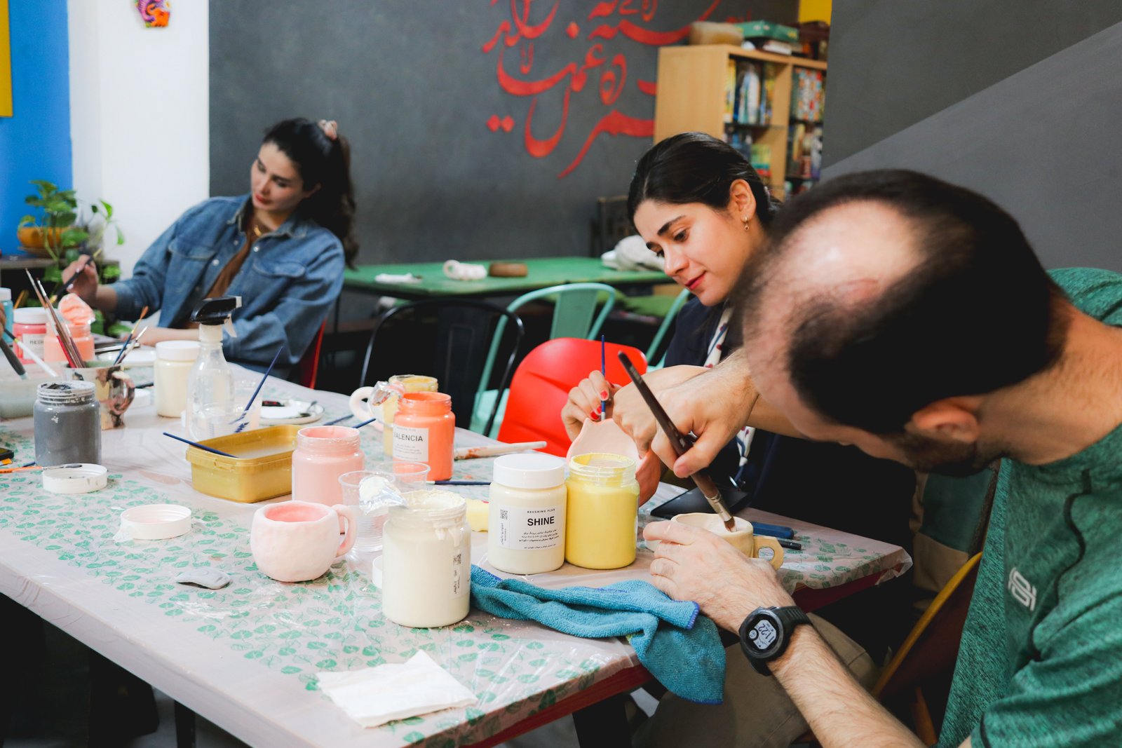 Members enjoying a pottery studio session together