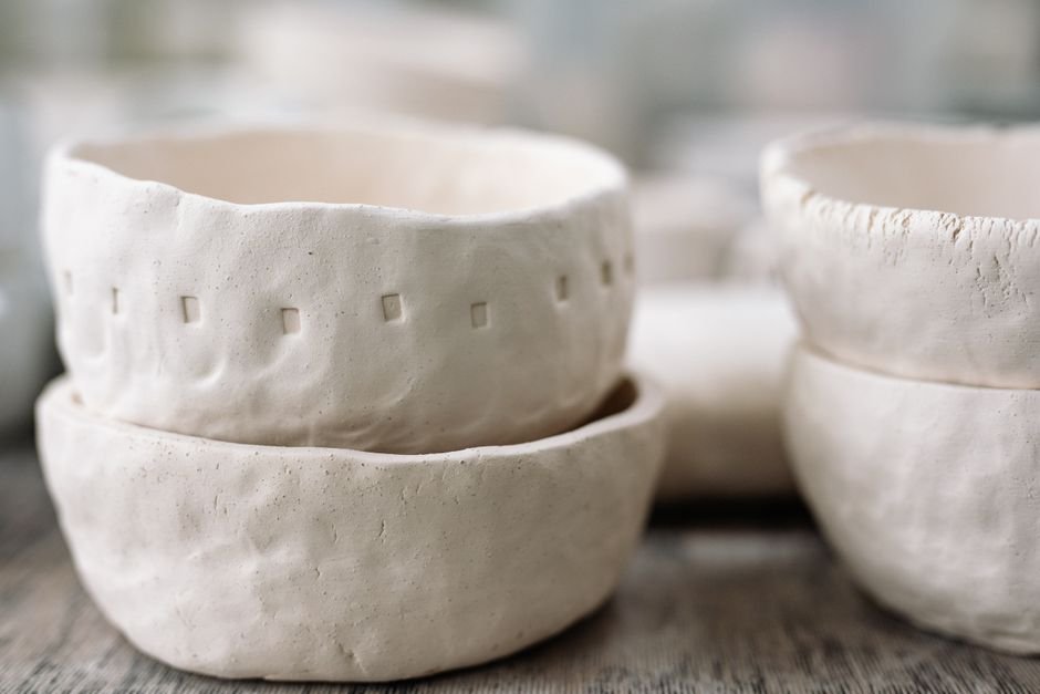 Rustic unglazed stoneware pottery inspired by Japanese ceramic tradition