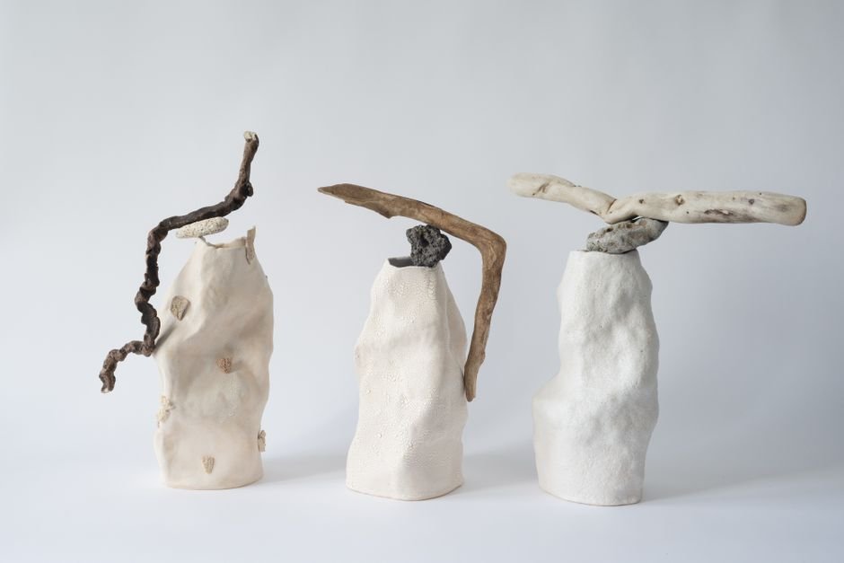 Sculptural ceramic art piece displayed in a gallery setting